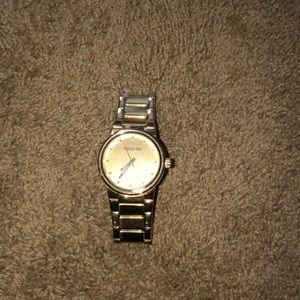 Gold color Nixon watch